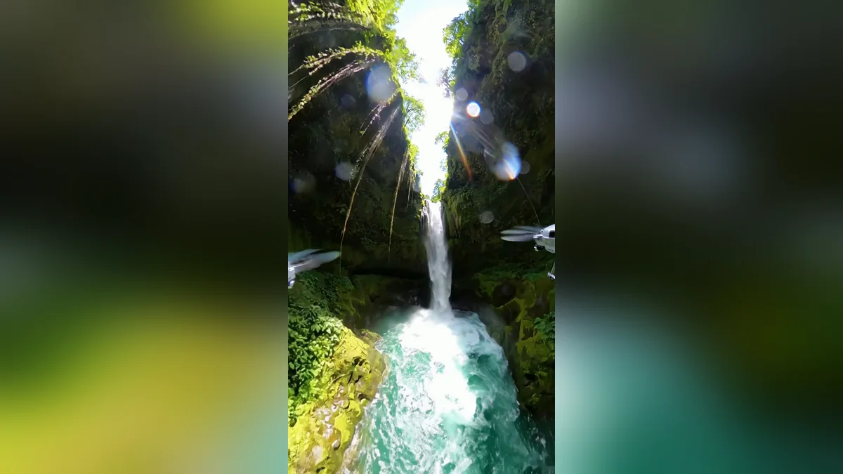 Example result: FPV drone dive through a waterfall canyon